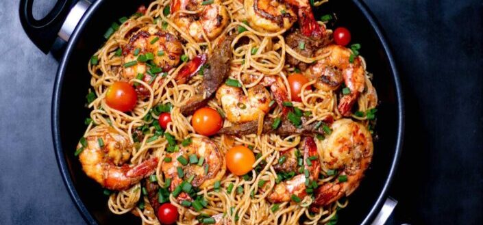 Seafood Pasta With Shrimps and Tomatoes in a Pan