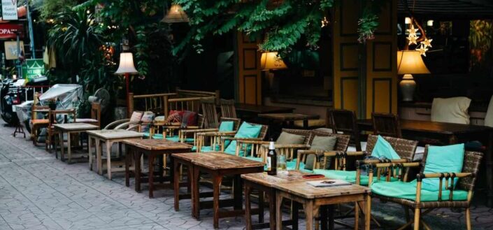 chairs and tables outside of a restaurant